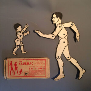 Two jointed card artists lay figures. 1950s